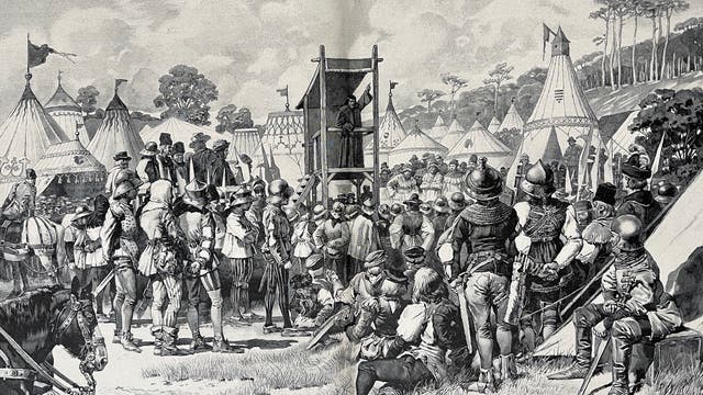 Ein Priester predigt zu mittelalterlichen Landsknechten in einem Feldlager.